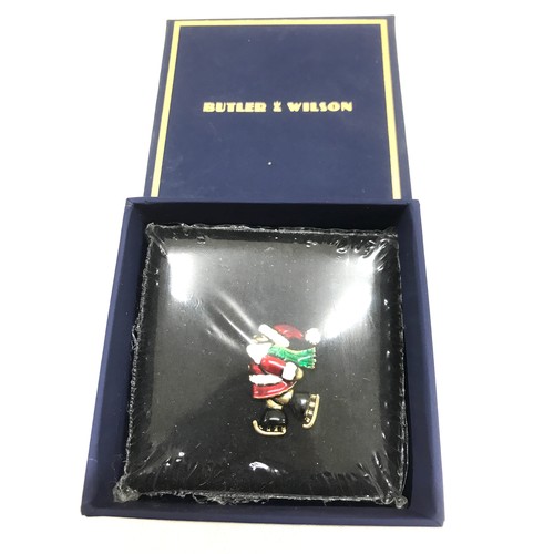 541 - 2 Brand new in the Packaging Butler and Wilson Santa Skating Pin badge