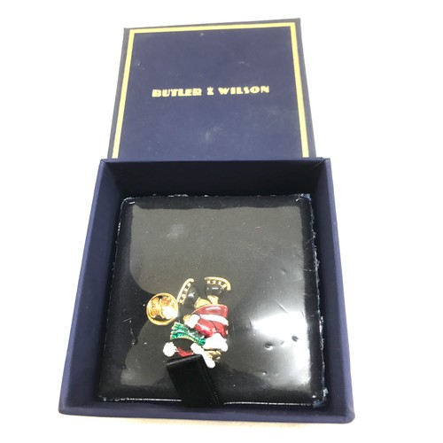 541 - 2 Brand new in the Packaging Butler and Wilson Santa Skating Pin badge