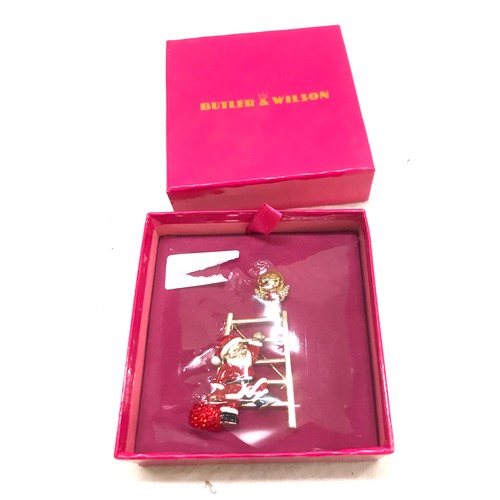 550 - Butler and Wilson Santa on a ladder Christmas brooch