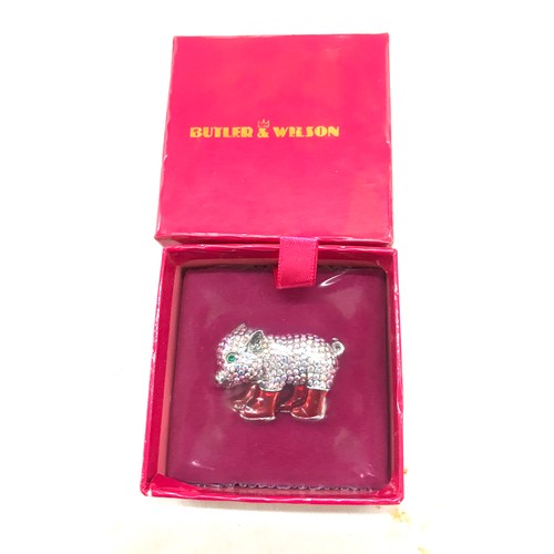 549 - Four brand new in box Butler and Wilson Brooches includes Pig, Ginger bread etc