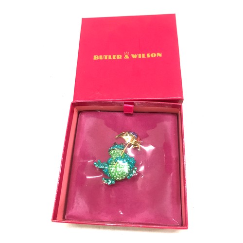 538 - Butler and Wilson Frog With umbrella brooch, brand new in box