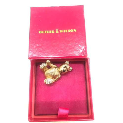 525 - 5 Boxed Butler and Wilson brooches/ compact