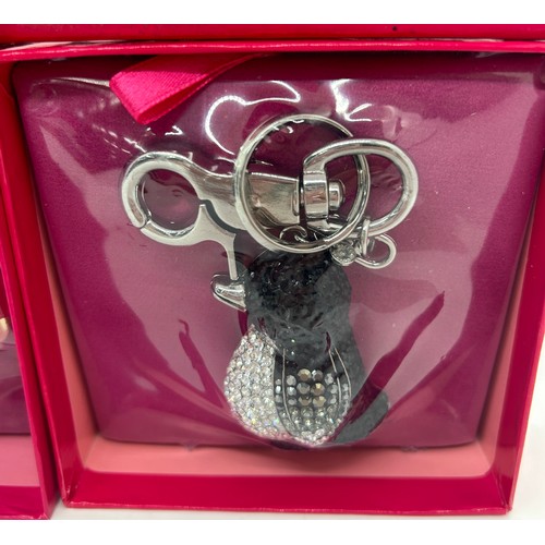 534 - Boxed as new Butler & Wilson Crystal Penguin and Bear Keyring