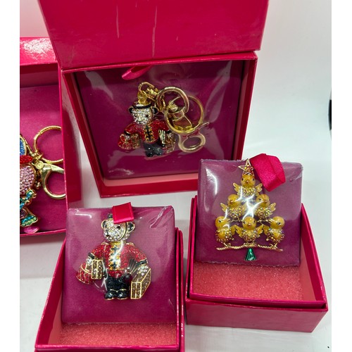 552 - Selection 5 boxed as new vintage Butler and Wilson keyrings and brooches to include a bunny, teddy b... 