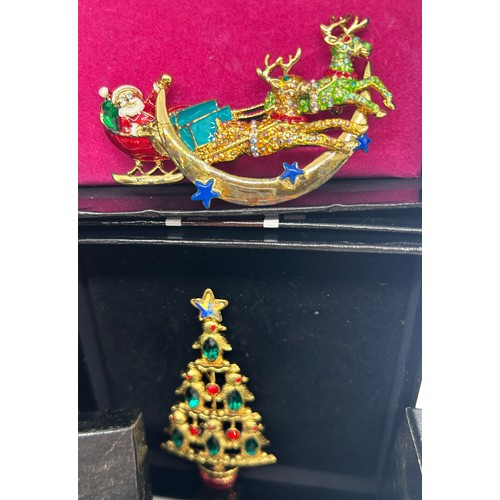 548 - Selection of Boxed vintage Butler and Wilson Christmas theme brooches to include Christmas trees, du... 