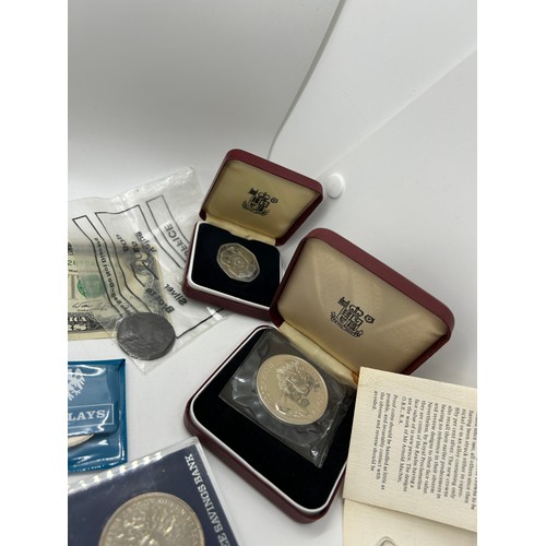 451 - Large selection of vintage and later coins to include a half dollar silver coin, decimals etc