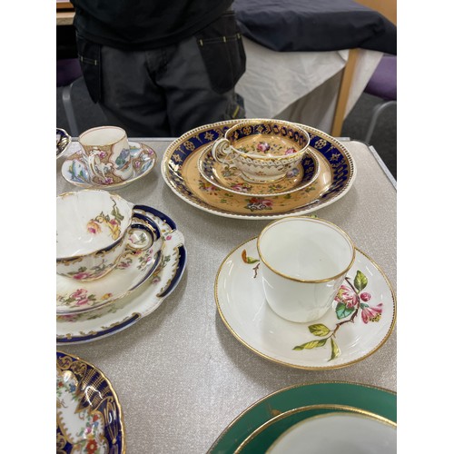 88 - Selection of assorted cups and saucers and some trio sets includes Royal Doulton, Ainsley etc