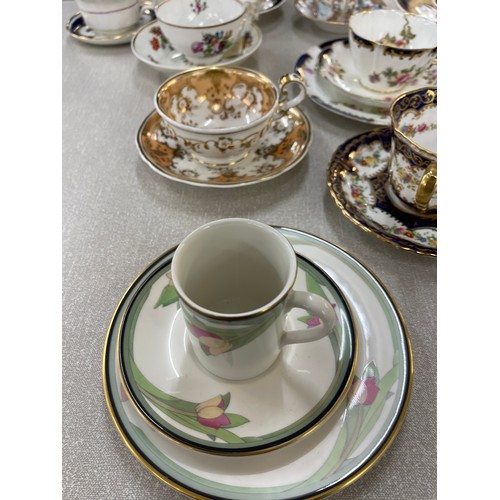 88 - Selection of assorted cups and saucers and some trio sets includes Royal Doulton, Ainsley etc