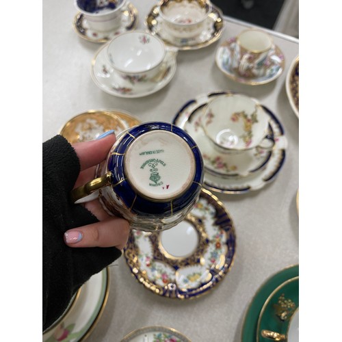 88 - Selection of assorted cups and saucers and some trio sets includes Royal Doulton, Ainsley etc