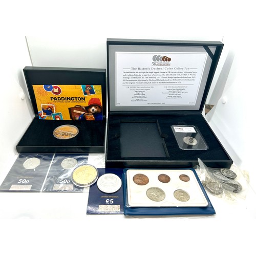 421 - Selection of english and foreign coins to include a proof £5 coin proof 2021 50p piece Paddington be... 