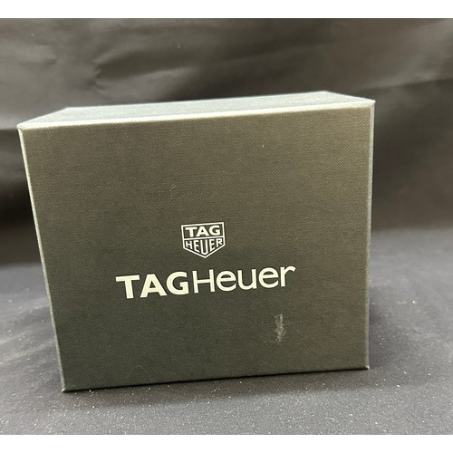 567 - Original Tag Heuer watch box and booklet, untested