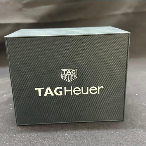 567 - Original Tag Heuer watch box and booklet, untested