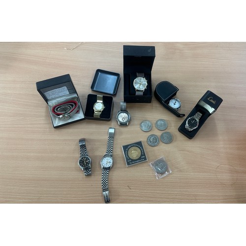 564 - Selection of gents wrist watches and mixed coins