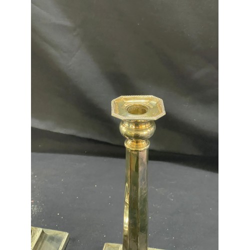 123 - Pair of silver plated candle sticks height 11 inches