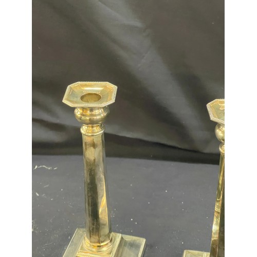 123 - Pair of silver plated candle sticks height 11 inches