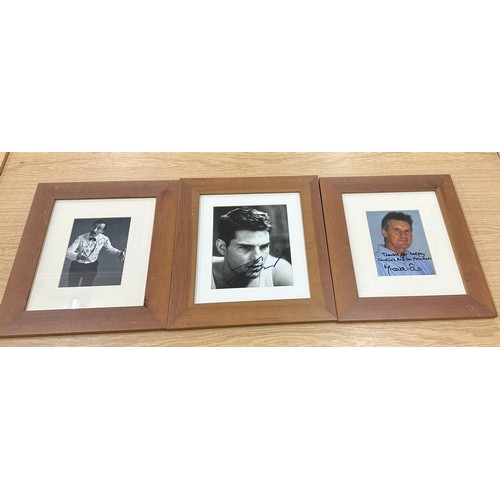 97 - Three framed signed photos, two authentic by Andrew Sachs and Michael Palin, and one possibly the si... 