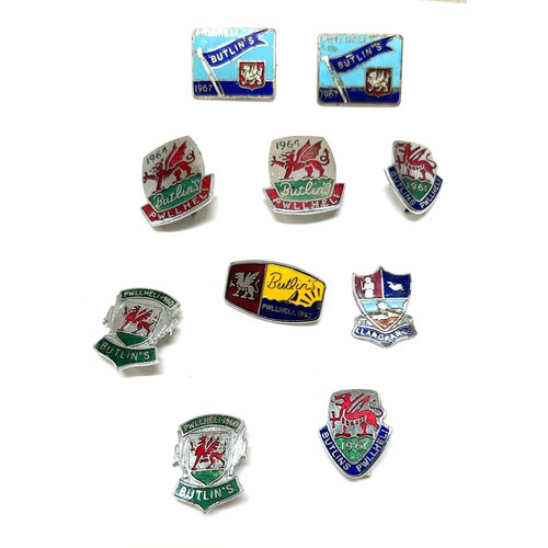 509 - 10 x vintage Welsh enamel Butlins badges from 1960 onwards