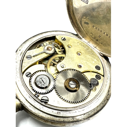 566 - Antique silver omega pocket watch the ticks and stops fully wound