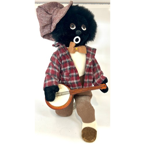 143 - Merrythought Golly teddy playing banjo, overall height 12 inches