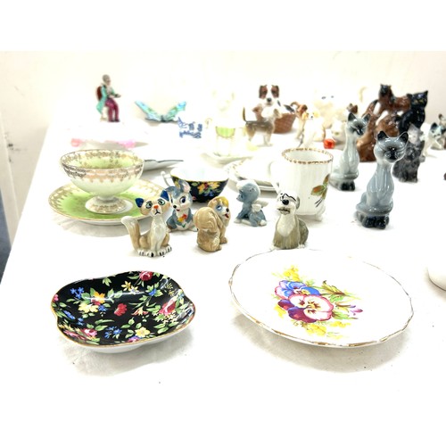 11 - Selection of animal ornaments, miniature cups/ saucers, selection of Wade Lady and the Tramp whimsie... 