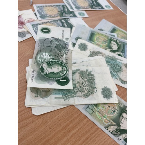 448 - Selection of 30 £1 notes and 10 shilling notes