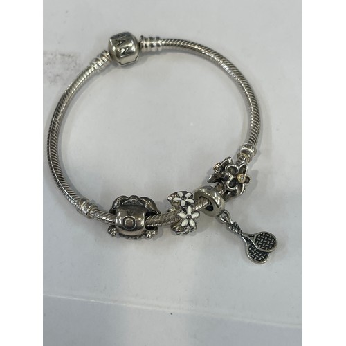 511 - Pandora bracelet and 4 charms