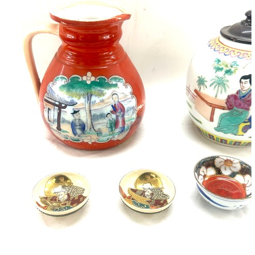 76 - Selection of oriental items to include jug, small dishes - some with character marks to base