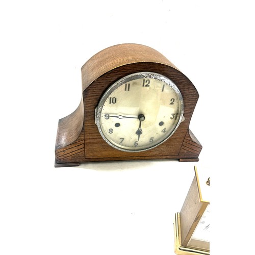 173 - Three clocks one mantel, two carriage largest measures 8.5 I inches tall by 12 inches wide and 5 dee... 