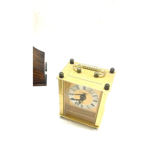 173 - Three clocks one mantel, two carriage largest measures 8.5 I inches tall by 12 inches wide and 5 dee... 