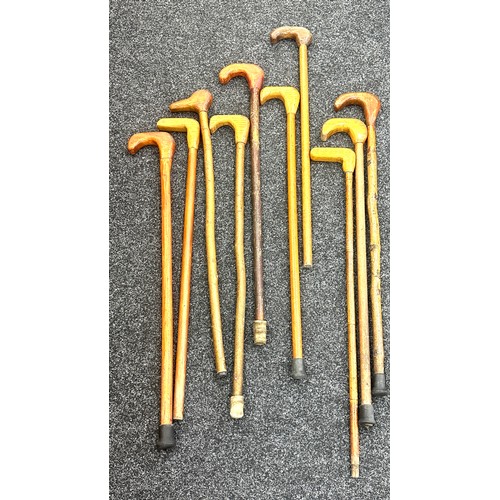 284 - Selection of vintage wooden walking sticks