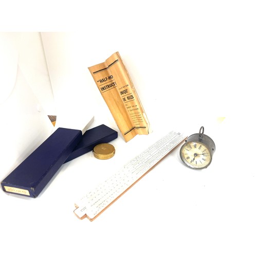 102 - Selection of collectables includes slide rule, and a antique 1887 clock