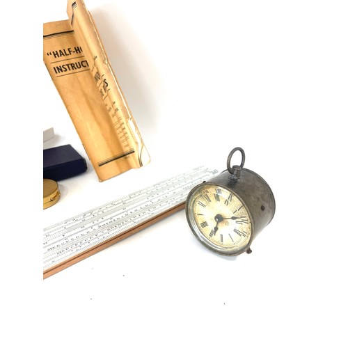 102 - Selection of collectables includes slide rule, and a antique 1887 clock