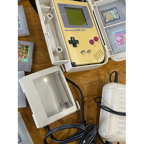 55 - Vintage gameboy and games with Grundig and Sony head phones, untested