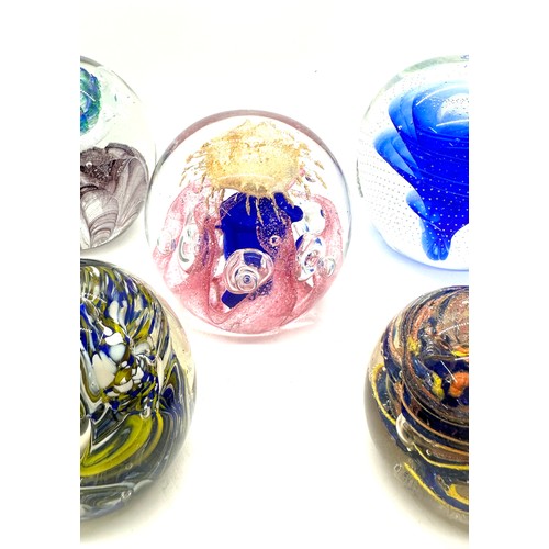 551 - Selection of assorted glass paper weights