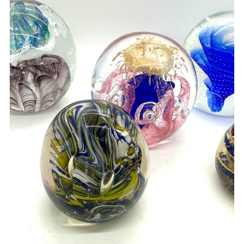 551 - Selection of assorted glass paper weights