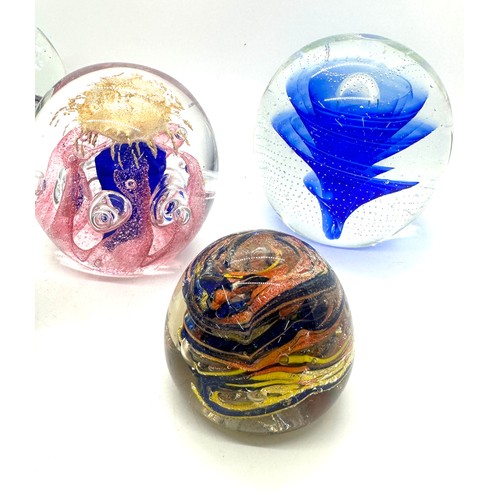 551 - Selection of assorted glass paper weights