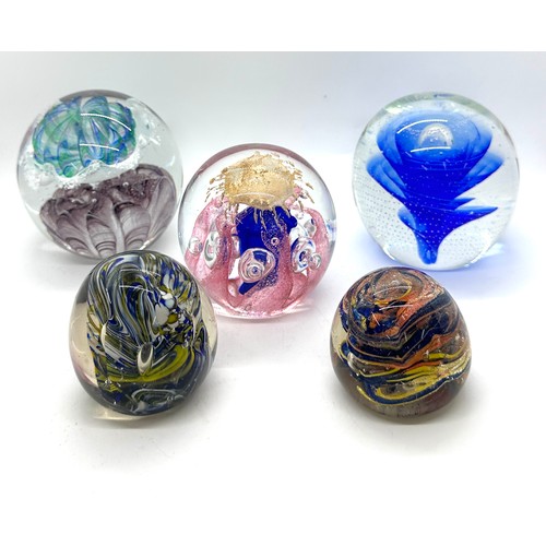 551 - Selection of assorted glass paper weights