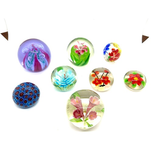 105 - Selection of assorted glass paper weights