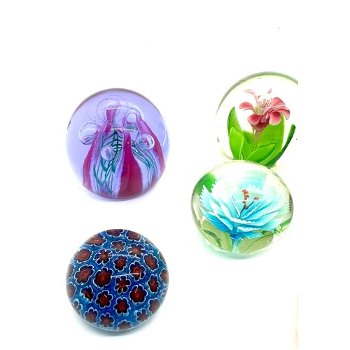 105 - Selection of assorted glass paper weights