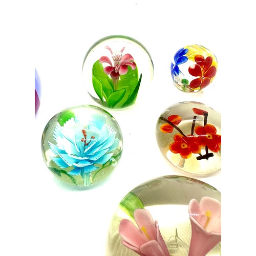 105 - Selection of assorted glass paper weights