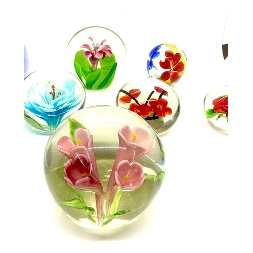 105 - Selection of assorted glass paper weights