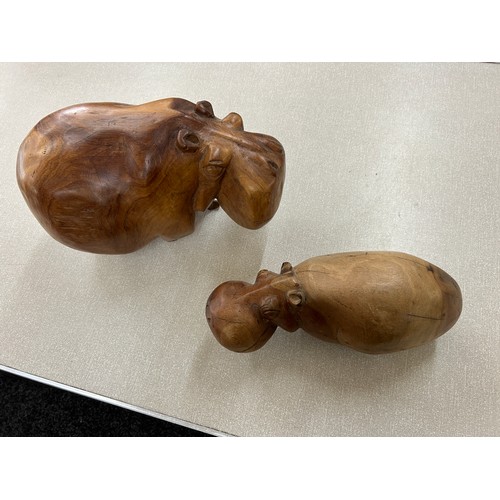 45 - 2 Carved wood hippopotamus figures