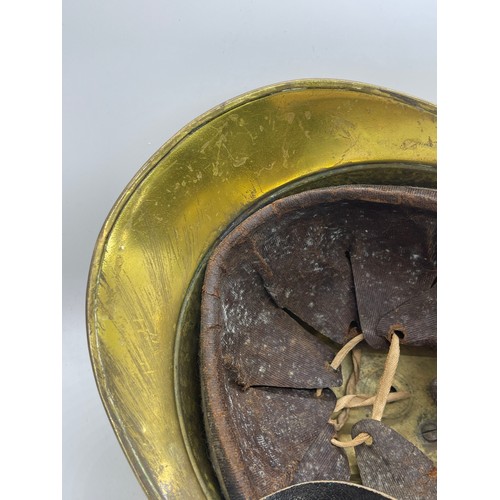 141A - Vintage French brass Fireman's helmet