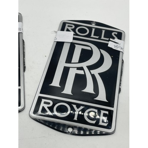 560 - 2 Rolls Royce plaques measures approximately 7 inches by 3.5 inches