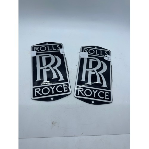 560 - 2 Rolls Royce plaques measures approximately 7 inches by 3.5 inches