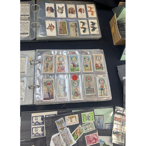 129 - Selection of vintage cigarette cards and stamps