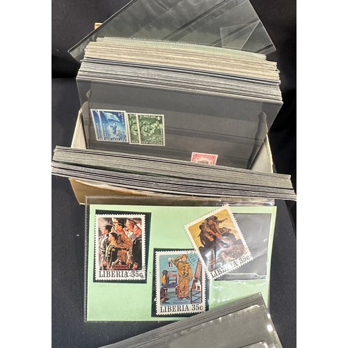 129 - Selection of vintage cigarette cards and stamps