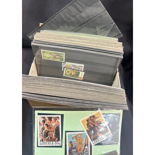 129 - Selection of vintage cigarette cards and stamps