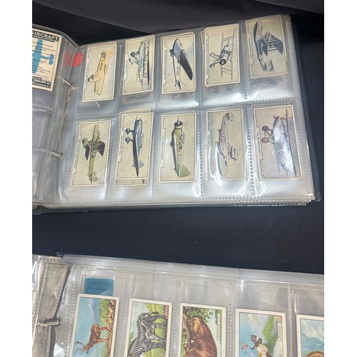 129 - Selection of vintage cigarette cards and stamps