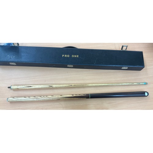 251 - Cased 3 piece pool cue with a light weight attachment